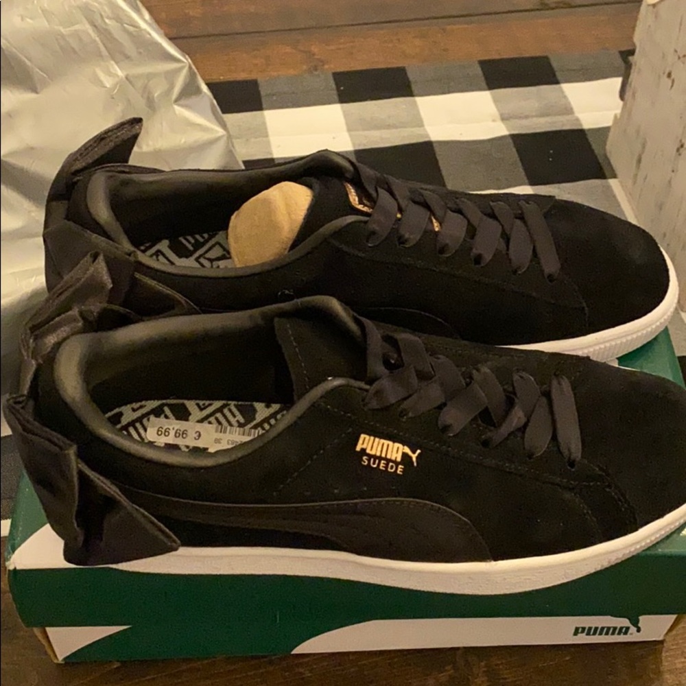 Rare Puma black on black suede bow sneakers